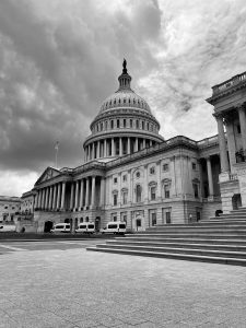 a black and white photo of the u s capitol building
