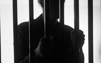 Immigrants Held in U.S. Prison Sue Over Harsh Conditions