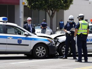 Traffic accident scene in Los Angeles with damaged vehicles