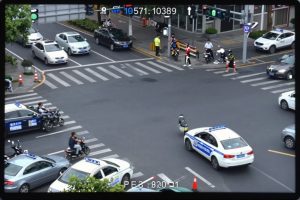 Traffic camera footage showing car accident intersection